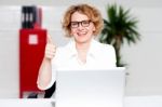 Businesswoman Gesturing Thumbs Up Stock Photo