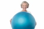 Senior Woman Posing With Exercise Ball Stock Photo