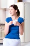 Woman Having A Cup Of Tea Stock Photo