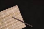 Chopsticks On Bamboo Matt Stock Photo