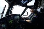 Helicopter Pilot In Flight For Oil Rig Operation Stock Photo