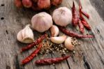 Herbs And Spices On Wooden Background Stock Photo