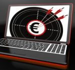 Euro Symbol On Laptop Shows Earnings Stock Photo