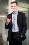 Businessman Using Mobile Phone Stock Photo