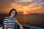 Women Tourist Cruising At Sunset Stock Photo