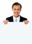 Businessman Holding Blank Board Stock Photo