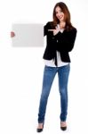 Lady Pointing At Blank Board Stock Photo