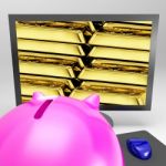 Gold Bars Screen Shows Shiny Valuable Treasure Stock Photo