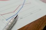 Business Graph And Pen Stock Photo