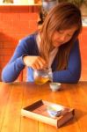 Asian Girl Drinking Tea In Morning Stock Photo