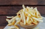 French Fries On Tablecloth Stock Photo