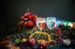 Two Glasses Of Champagne With A Christmas Decor In The Background Stock Photo