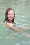 Young Girl In Pool Stock Photo