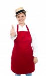 Aged Lady Chef Showing Thumb Up Stock Photo