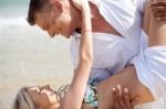 Romantic Couple Enjoying At Beach Stock Photo