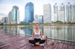 Young Woman Doing Yoga Exercises Stock Photo