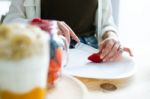 Beautiful Young Woman Preparing Breakfast At Home Stock Photo