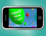 Happy New Year On Mobile Screen Stock Photo