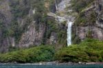 Waterfall At Milford Sound Stock Photo