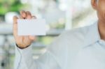 Man Holding White Card Stock Photo