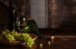 Wine And Grapes On The Table Stock Photo