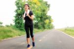 Girl Is Jogging Stock Photo