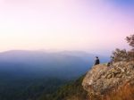 Young Man  Asia Tourist  At Mountain Is Watching Over The Misty Stock Photo