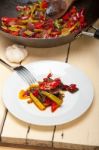 Fried Chili Pepper And Vegetable On A Wok Pan Stock Photo