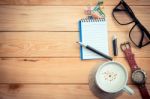 Coffee Cup On Workspace Wood Table Stock Photo