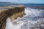 The Cobb Harbour Wall In Lyme Regis Stock Photo