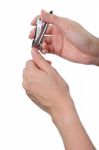 Woman Hand Manicure With Nail Clipper Stock Photo