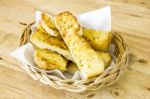 Garlic Bread Served In Basket On Wooden Background Stock Photo