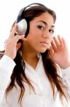 Cute Girl Posing With Headphones Stock Photo