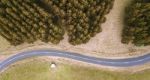 Road And Field In The Tasmanian Countryside Stock Photo