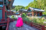 Woman With Hanbok In Gyeongbokgung,the Traditional Korean Dress Stock Photo