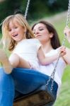 Mother And Daughter Having Fun Outdoors Stock Photo