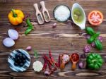 The Ingredients For Homemade Pizza On Shabby Wooden Background Stock Photo