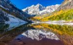 Winter And Fall Foliage In Maroon Bells, Aspen, Co Stock Photo