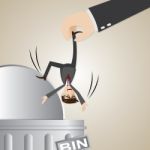 Cartoon Businessman Dropped Into Trashcan Stock Photo