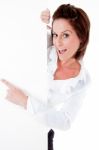 Young Female Holding A Blank Billboard Stock Photo