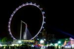 Singapore Flyer Illuminated At Night Stock Photo