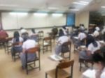 Blur Background University Students Writing Answer Doing Exam In Stock Photo