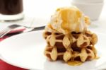 Ice Cream And Waffles With Syrup Stock Photo