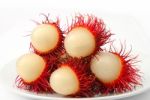 Rambutan Fruit On Plate Stock Photo