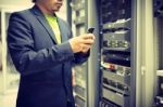 Man Fix Server Network In Data Center Room Stock Photo