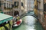 Restaurant Alongside A Canal In Venice Stock Photo