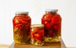 Three Glass Jars With Marinated Tomatoes Homemade Stock Photo