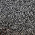 Closeup Of The Black Tar Surface Of An Asphalt Road Stock Photo