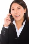 Asian Businesswoman With Mobile Stock Photo