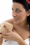 Close View Of Woman Opening The Ribbon Of Scrubber Stock Photo